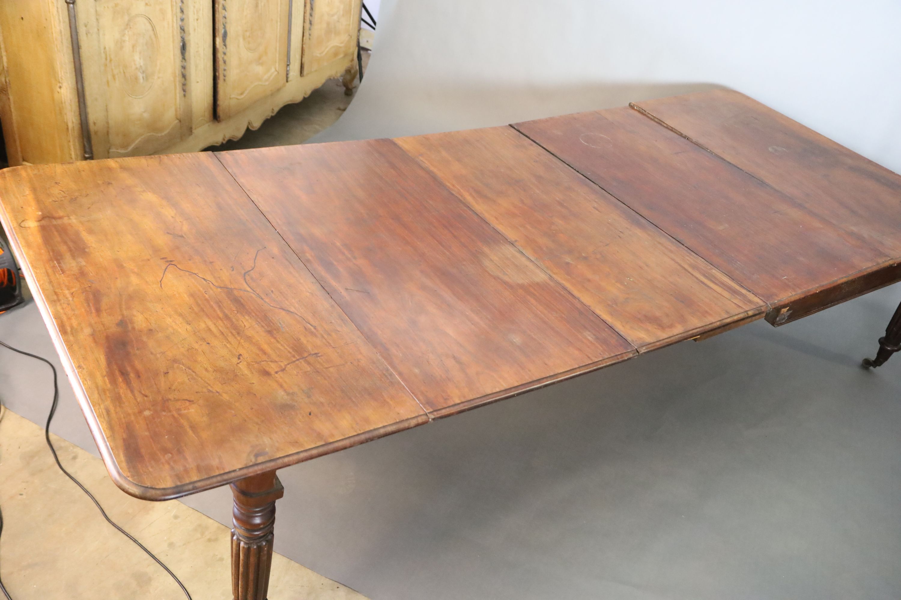 A Victorian mahogany extending dining table,